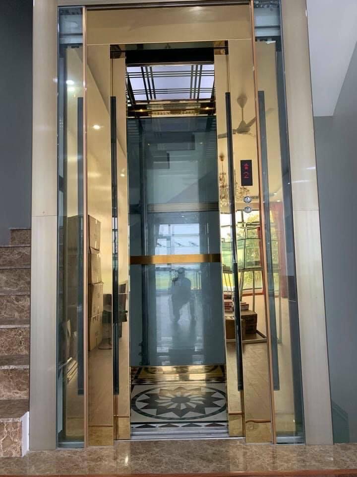 Modern elevator in commercial building lobby